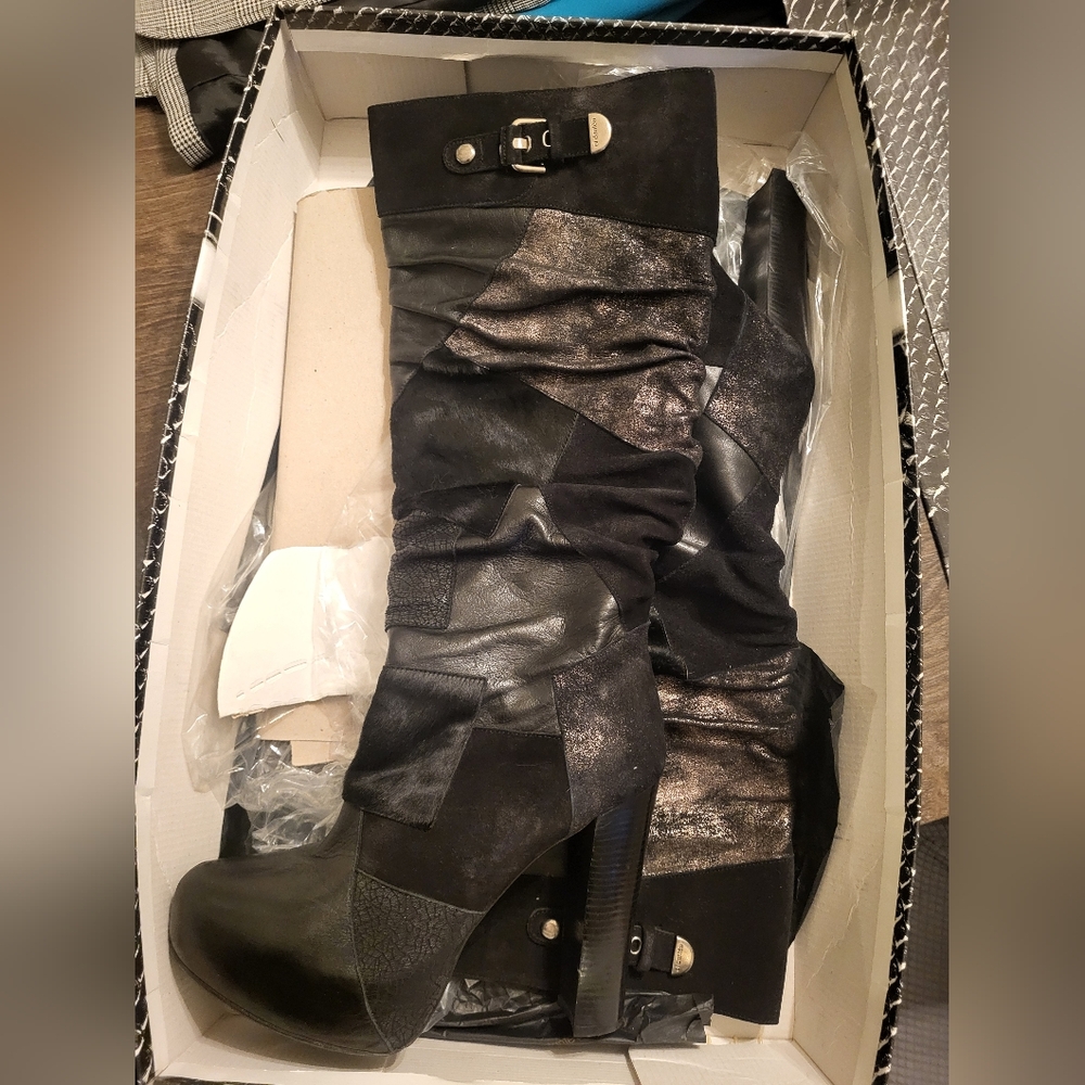 boots , black color,  100% leather,  size 40, usa 8.5-9